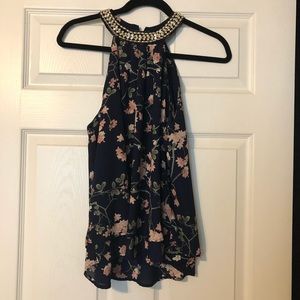 Navy blue blouse with jeweled neckline